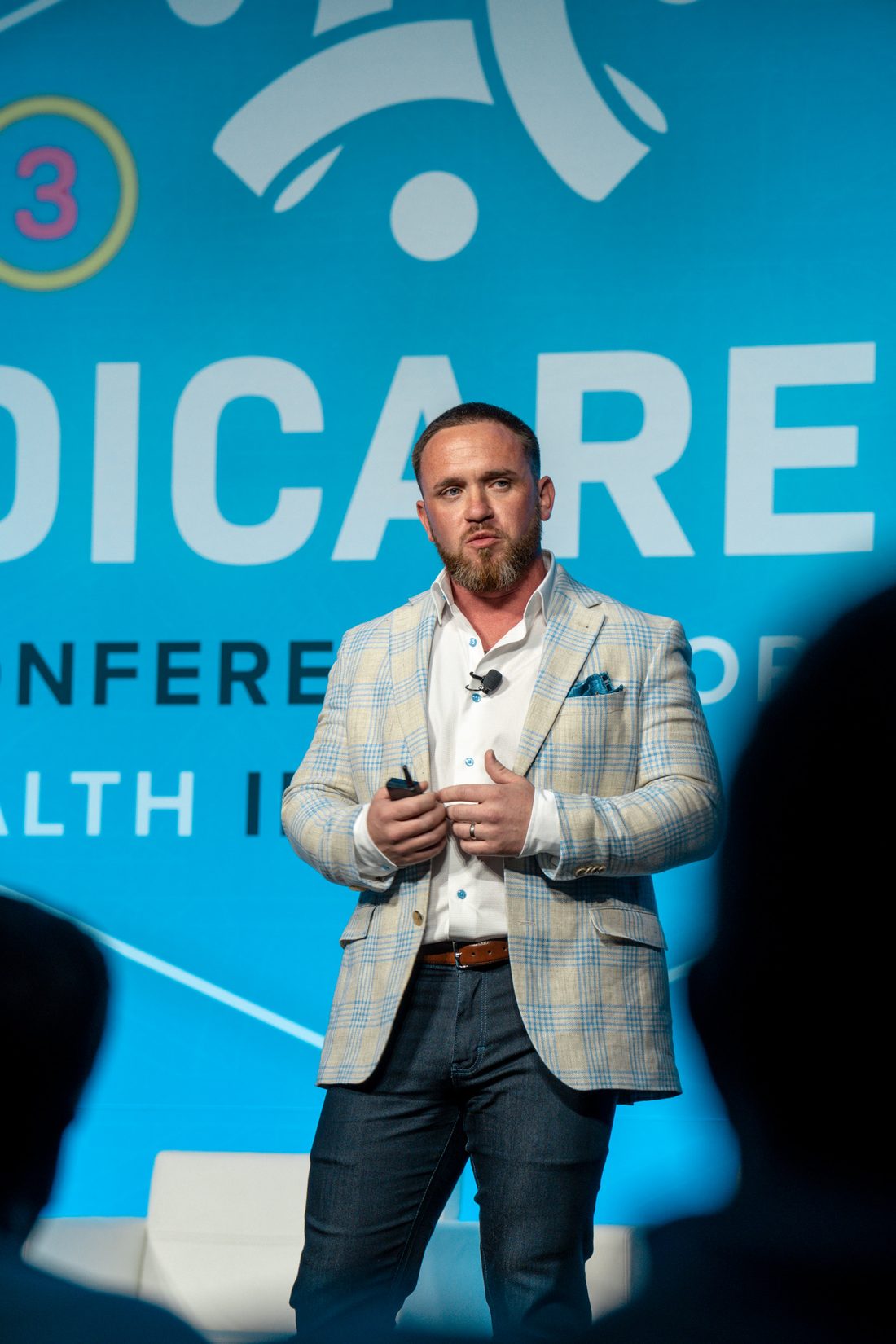 Justin Stark speaking on stage